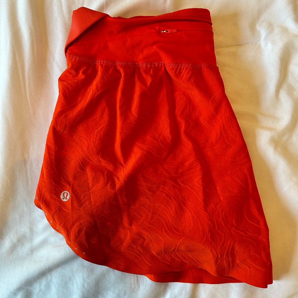 Fast and free - solar orange - high rise airflow shorts!!